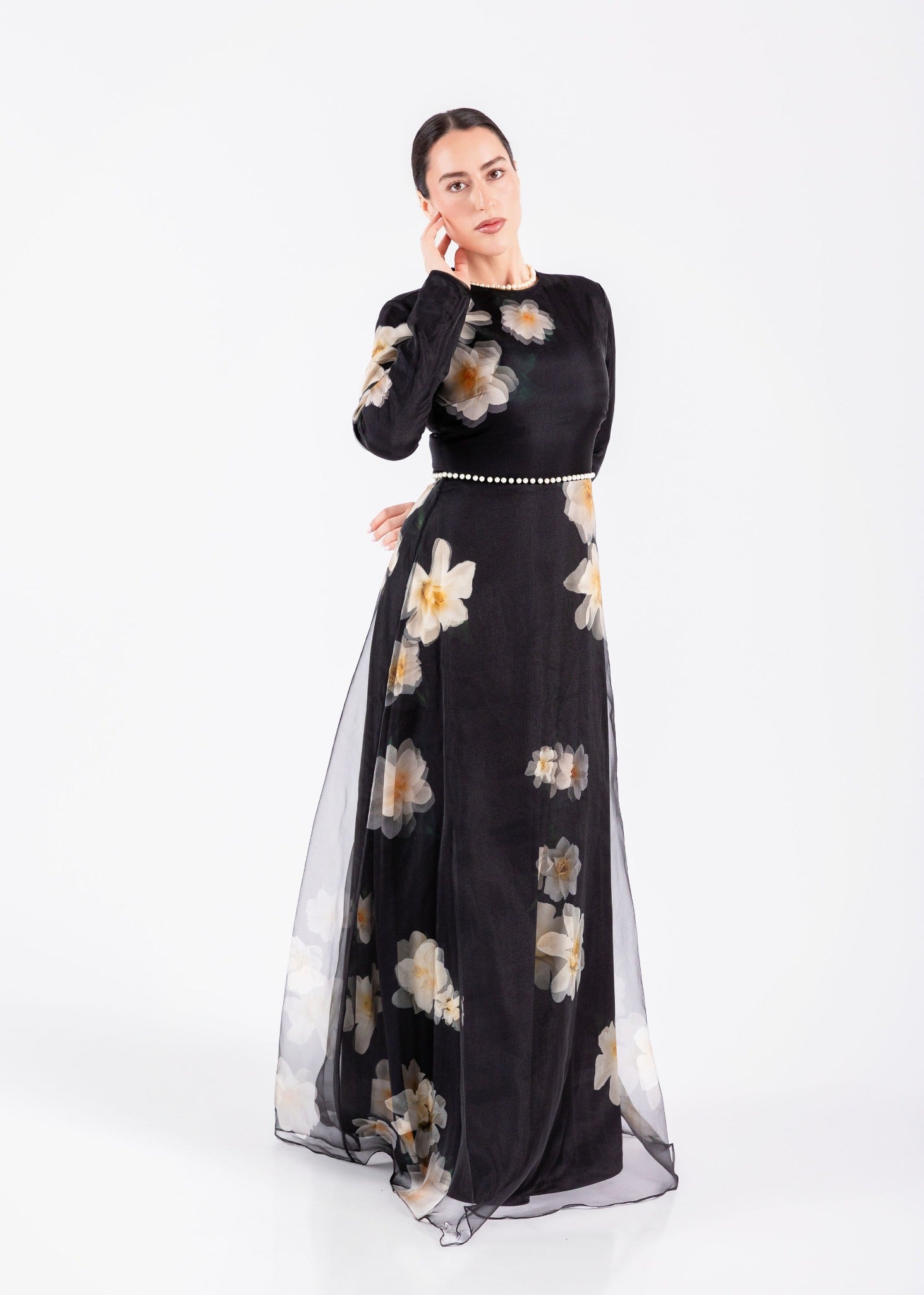 Full model wearing Heredis Auguri dresses